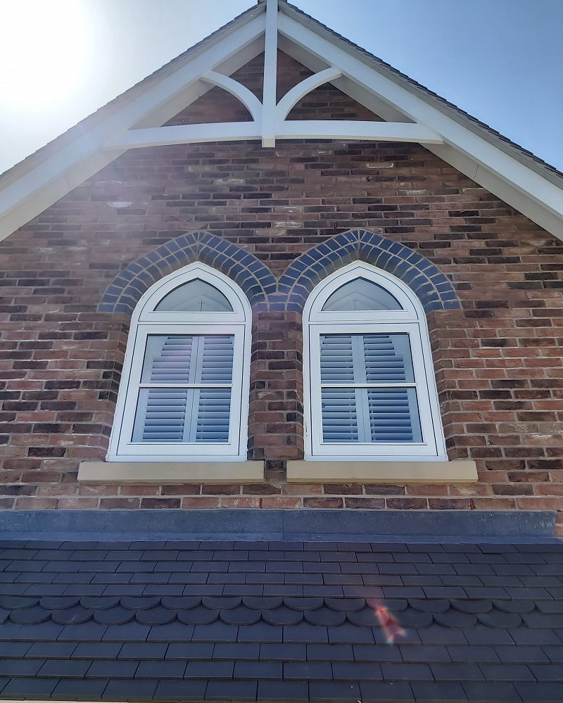 Gothic arch shutters